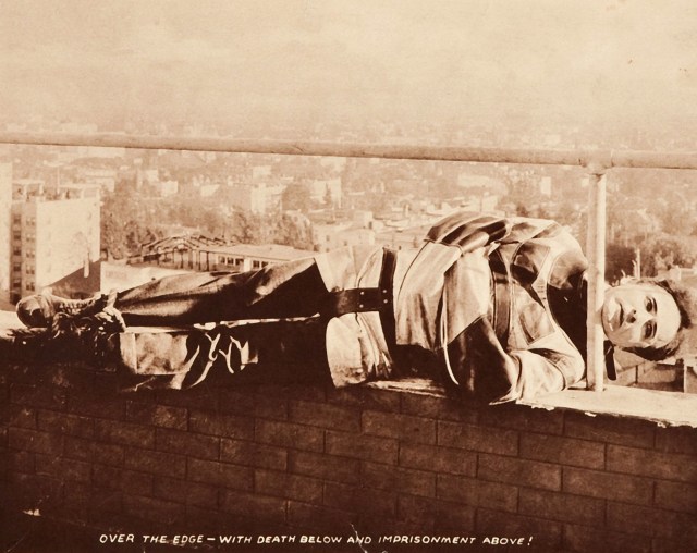 THE GRIM GAME, Harry Houdini on lobbycard, 1919.